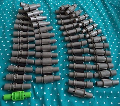 A mixed lot of used Nerf blasters of the kind sold together on eBay