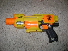 Yellow and orange Nerf N-Strike Barricade RV-10